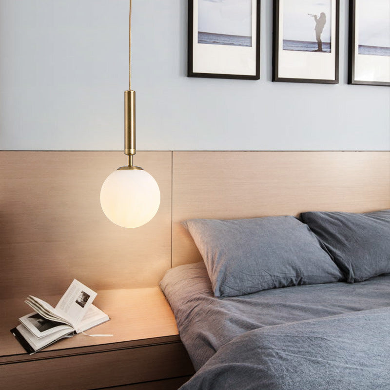 Brynn Modern White Glass Globe Pendant: Illuminate Your Space with Timeless Elegance