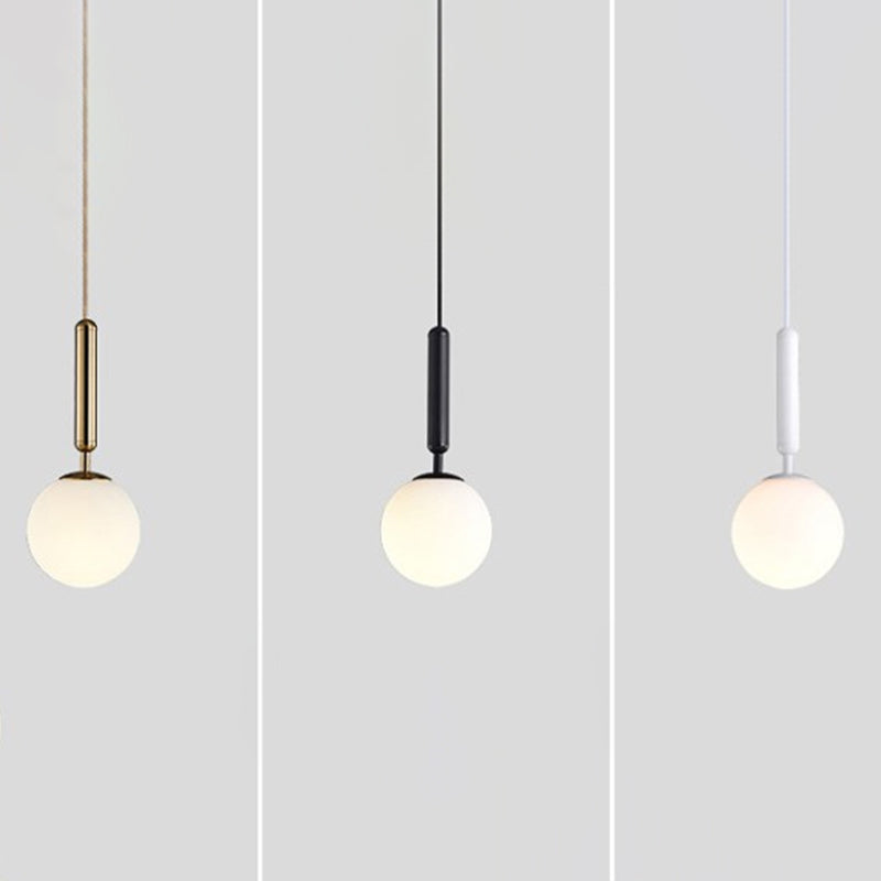 Brynn Modern White Glass Globe Pendant: Illuminate Your Space with Timeless Elegance