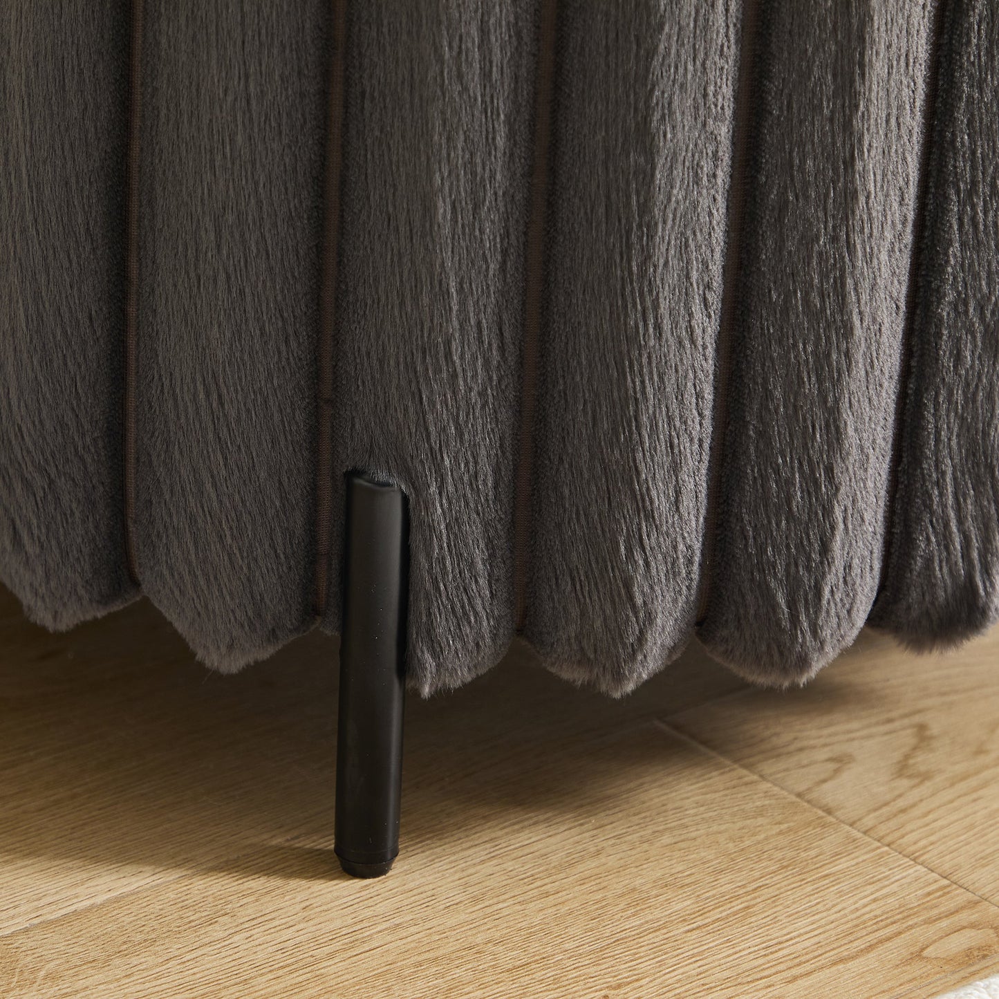 22.05' Wide Upholstered Round Pouf Ottoman Foot Rest with Black Metal Legs, Faux Fur Finish, Charcoal
