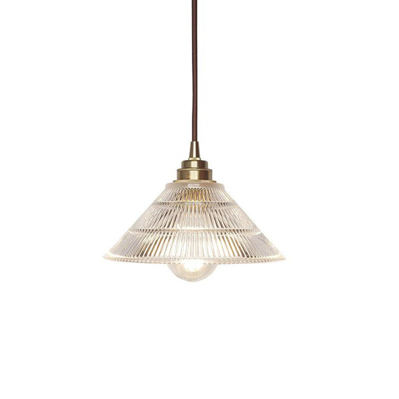 Enhance Your Dining Room with Industrial Elegance: The Brass Cone Pendant with Clear Ribbed Glass