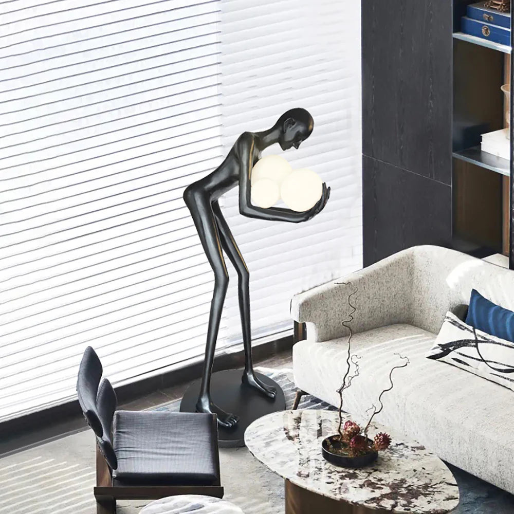 Figure Holding Ball Sculpture Floor Lamp