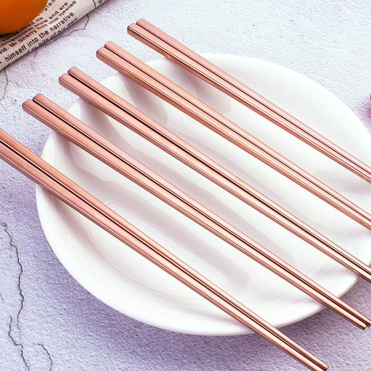 Dining & Tableware: Annie Rose Gold Chopsticks - Set of 4 by Tea + Linen